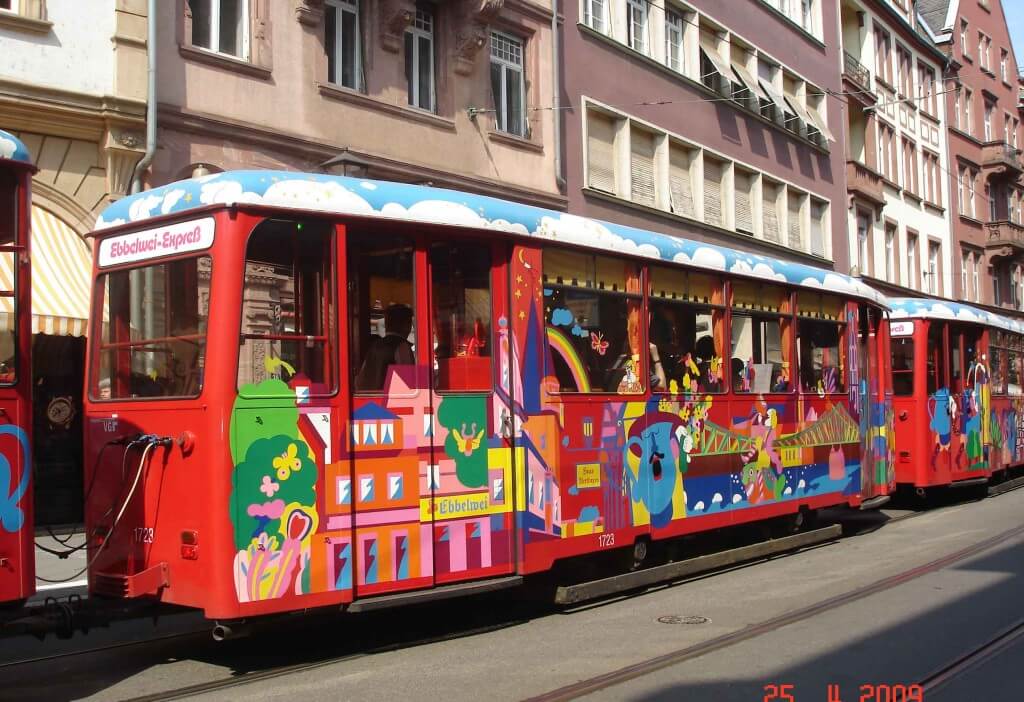 Colorful-Trams pass back and forth. Frankfurt Germany