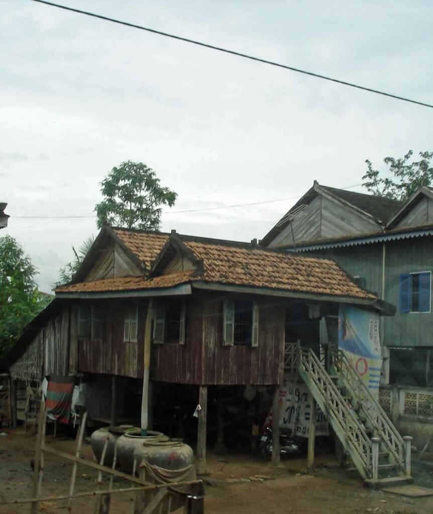 Traditional Homes - large clay vessels for water storage. Country-Cambodia