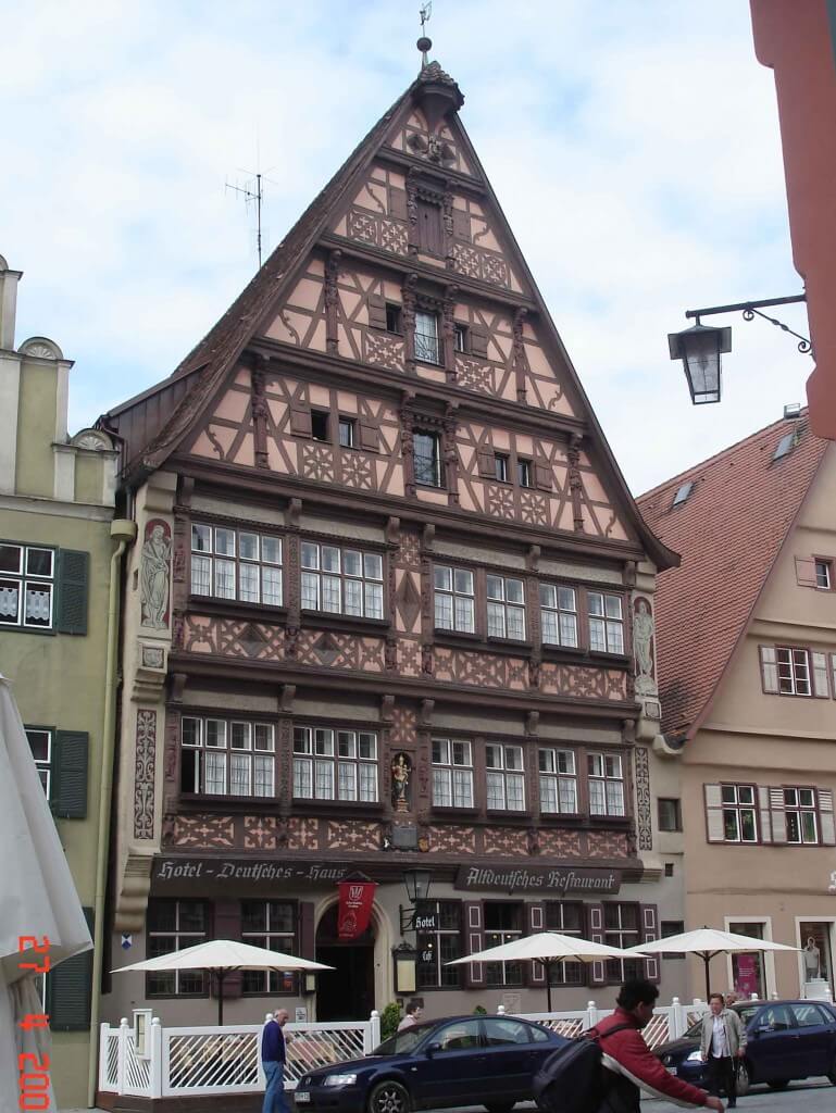 Dinkelsbuhl-"Deutsche-Haus" beautiful half-timbering design work, a late Renaissance facade and decorative statues-c