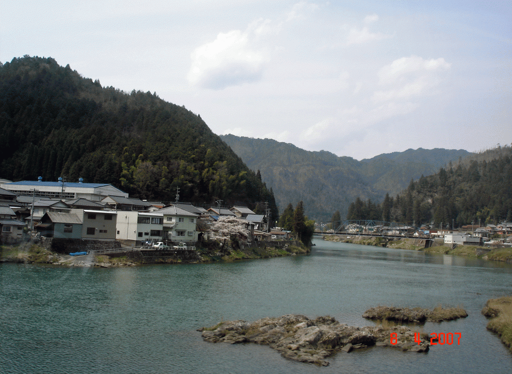 Timber forests and settlements along the river on the way to Odawarra Station