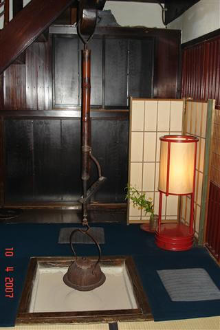  'Irori' or sunken hearth-overhead 'Jizai-kagi' an adjustable hanging hook