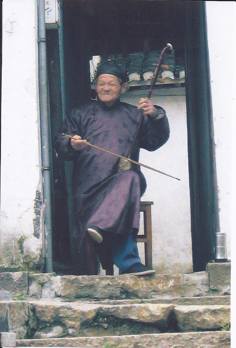 Old Man Playing Erhu