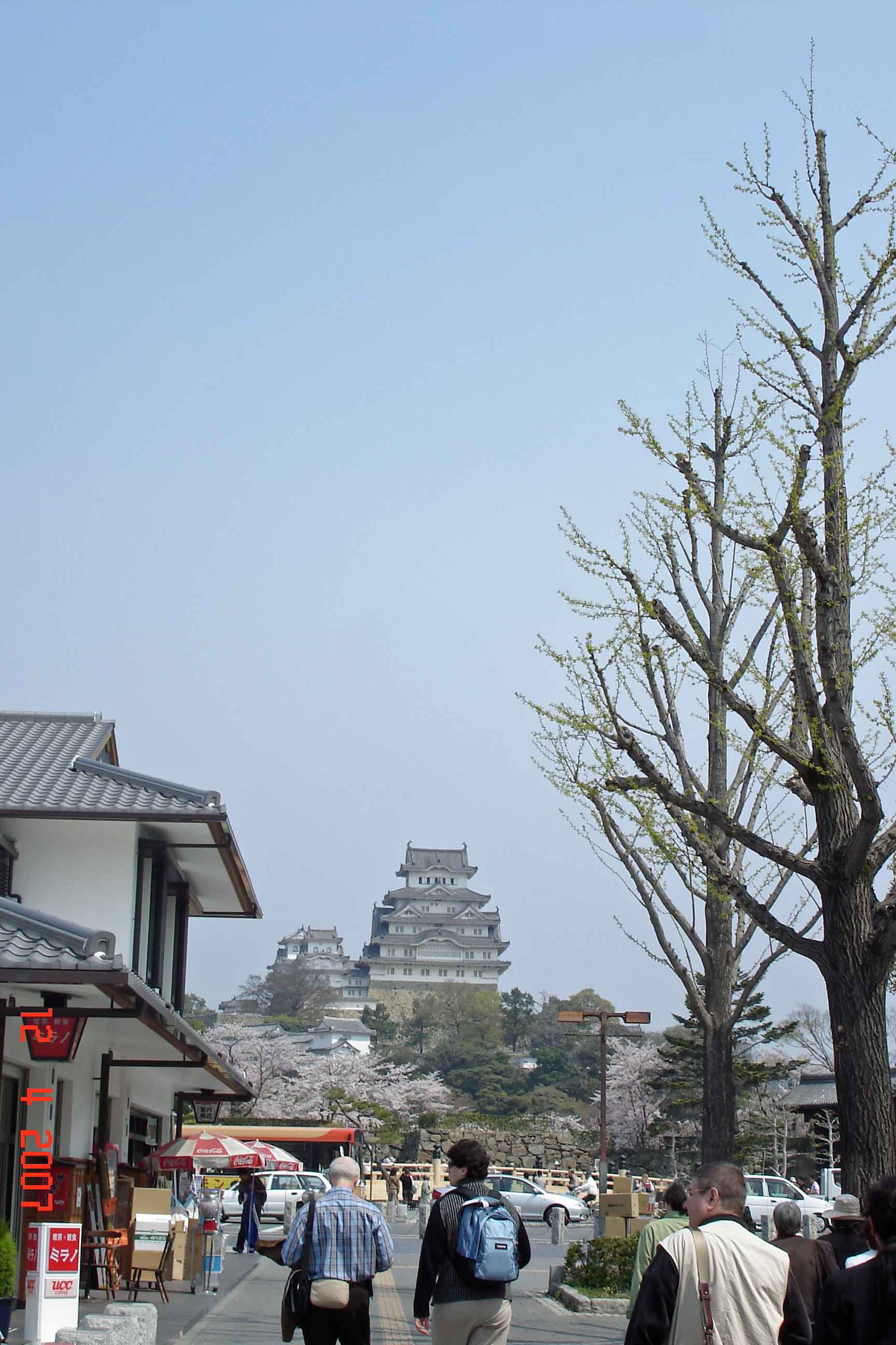 View of Hameji Castle walking down Otemae Street towards bridge and castle