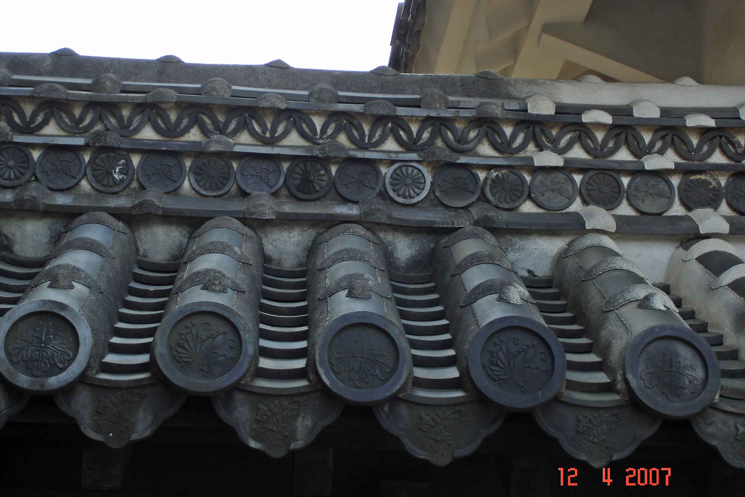 Roof gable with circle tiles of the family crest Himeji Castle