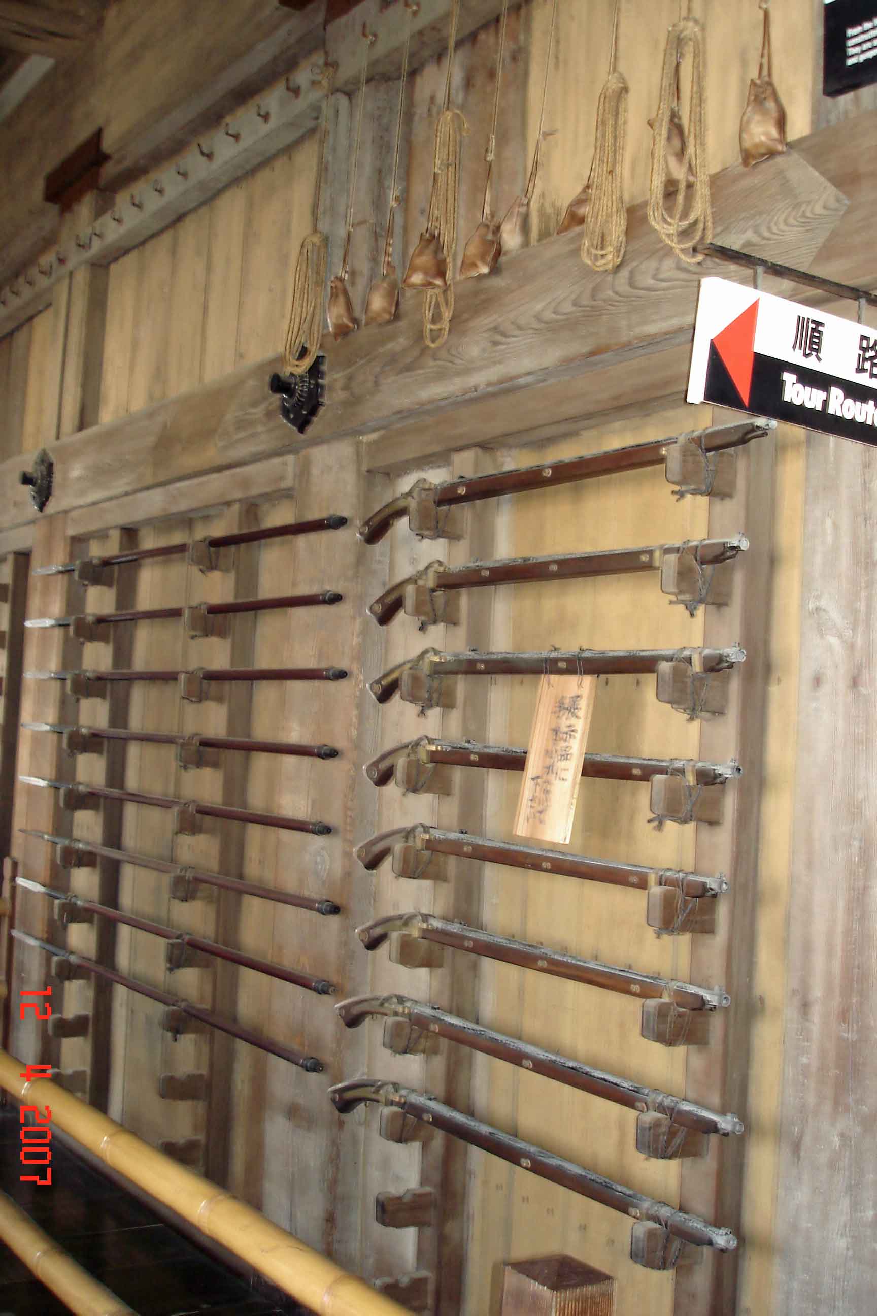 Racks of flintlocks and gun powder pouches-Himeji Castle