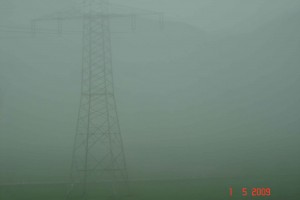Towers looming out of the fog - black forest outside town of Singen